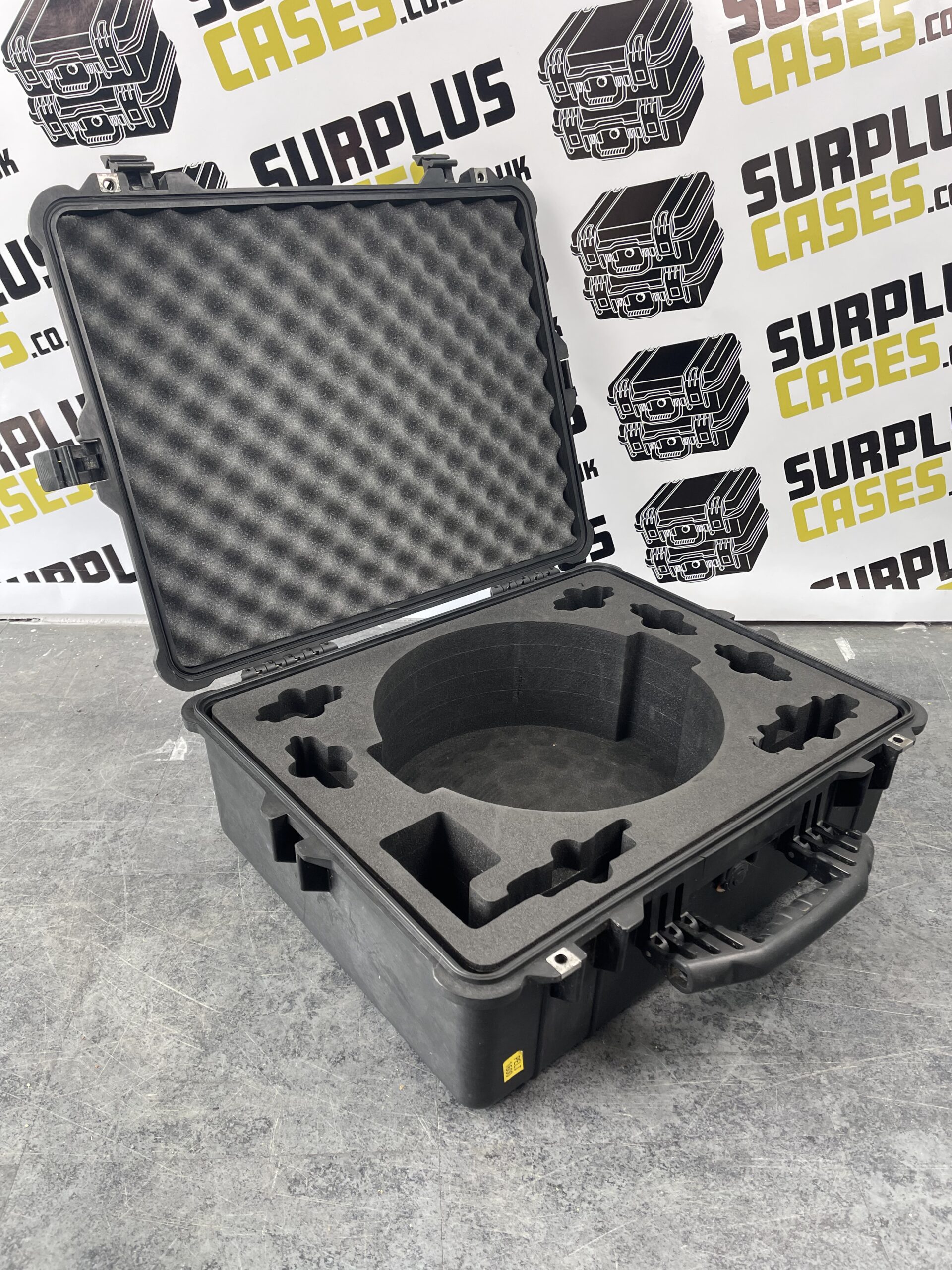 Used Peli case open showing foam insert, ideal for waterproof camera equipment storage UK